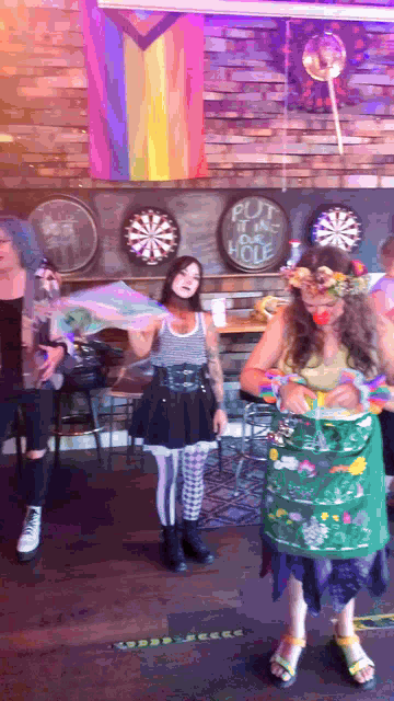 Smiley the clown (instagram: Lettuceeraser) performs on stage.